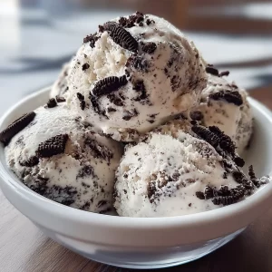 Delicious Cookies and Cream Ice Cream in a cone with chocolate cookie pieces