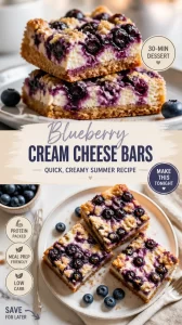 Delicious blueberry cream cheese bars with a creamy topping and fresh blueberries